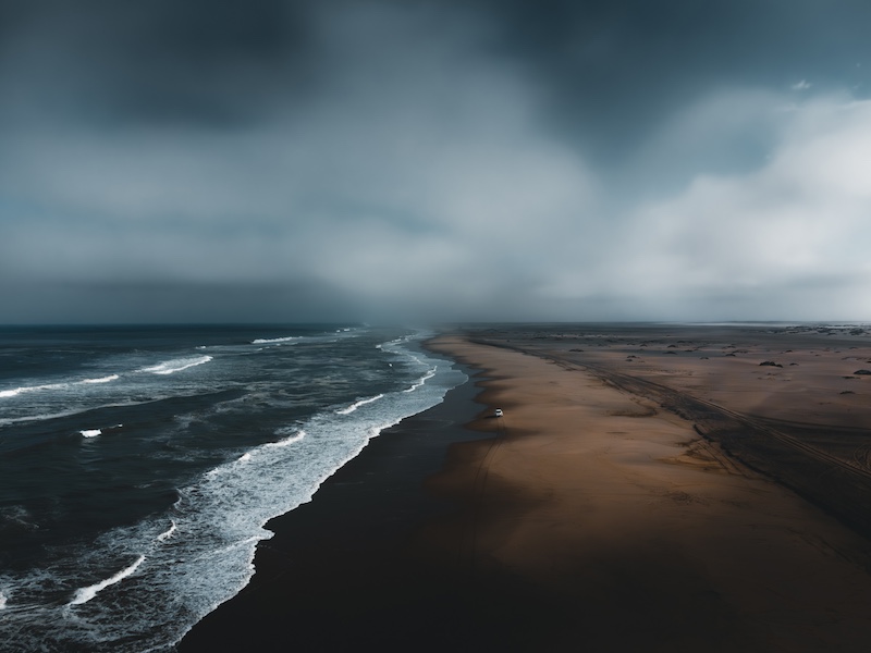 Moody Beach by Charl Conradie