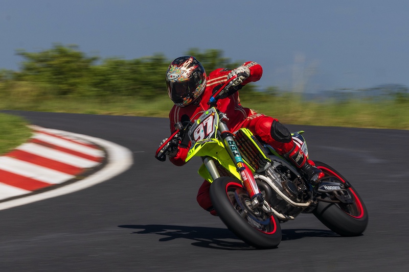 DCC BRONZE MEDAL-Photo Journalism and Sport-Cornering-Wendy Freer-Durban Camera Club